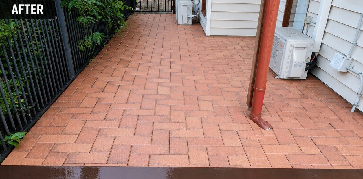 Clean restored paver pathway after pressure washing