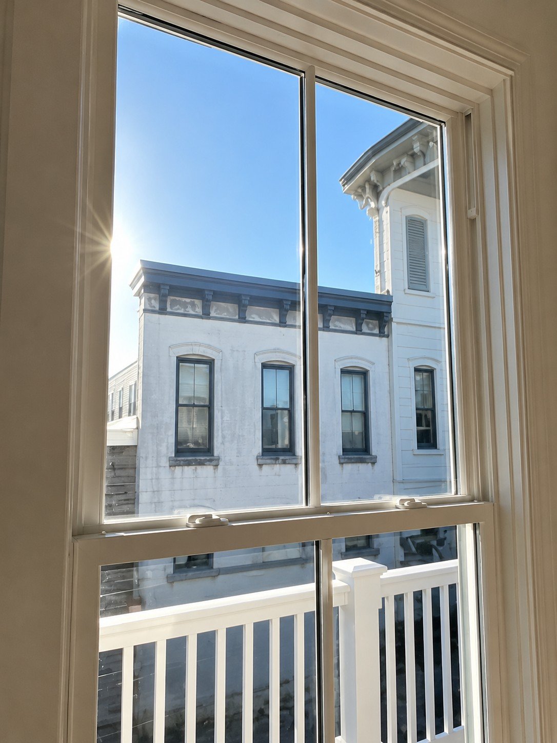 Crystal clear window after cleaning with city view